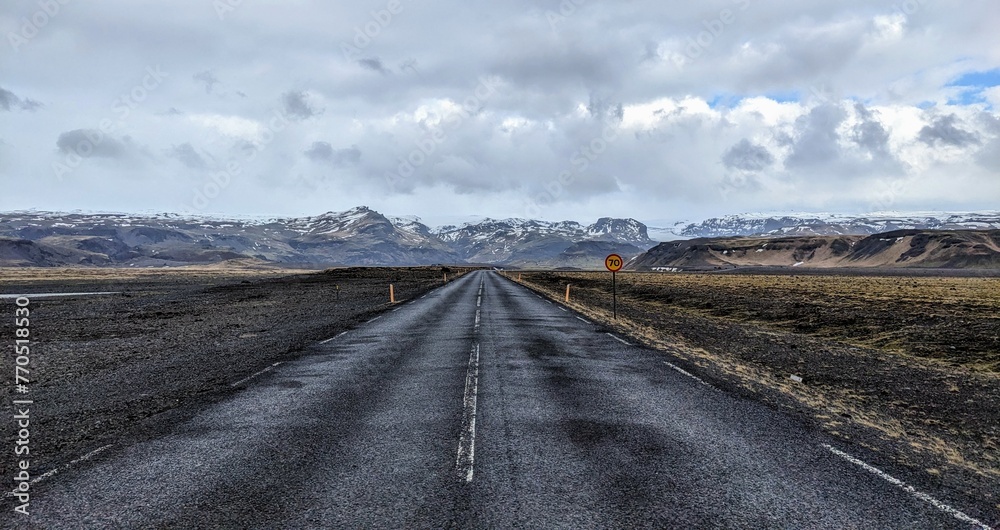 Naklejka premium Iceland road with mountains