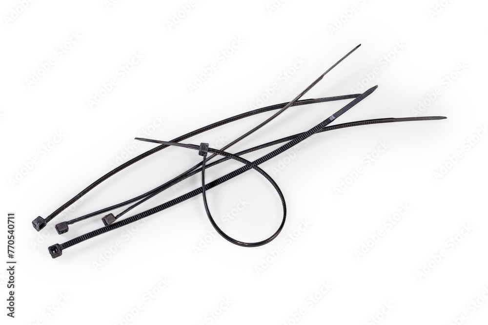 Black nylon unfastened and fastened cable ties on white background Black nylon unfastened and fastened cable ties on white background