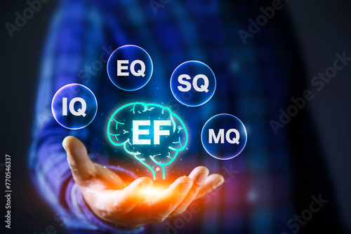 EF (Executive Functions), EF, IQ, EQ, SQ, and MQ icon at hand. Young children's brain skills It plays an important role in other skills such  IQ, EQ, SQ, and MQ grow with quality and success in life. photo