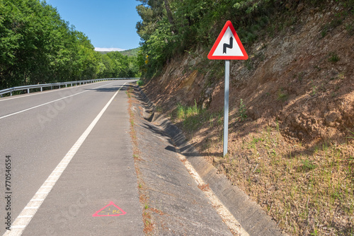 topography marking painted on a road, pink geodetic mark on the asphalt