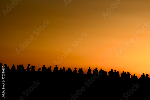 Florence, Italy - July 16, 2023: People waiting for the sunset on a bridge over Arno river in Florence, Italy © JEROME LABOUYRIE