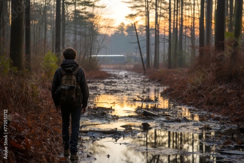 Lone traveler walking through industrial pollution in the forest, with a plastic-contaminated river