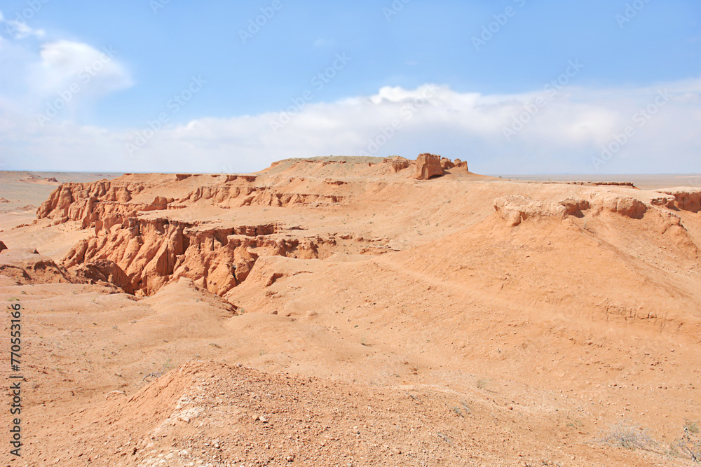 View on Bayanzag Flaming Cliffs on the Mongolian Gobi desert containing fossils of jurassic dinosaurs View on Bayanzag Flaming Cliffs on the Mongolian Gobi desert containing fossils of jurassic dinosaurs