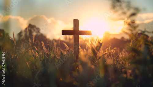 Ascension day concept. The cross on meadow autumn sunrise background., orthodox easter photo