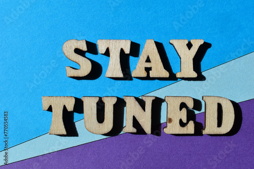 Slika na platnu Stay tuned, phrase meaning to keep listening or watching