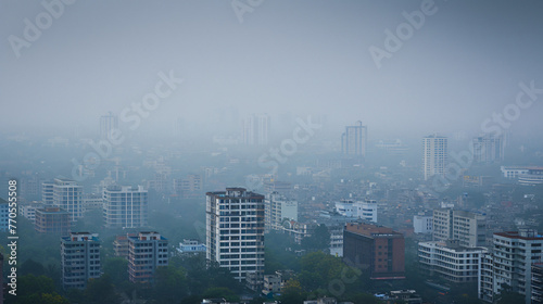 A cityscape showing smog and pollution hanging over the city reducing visibility and air quality.