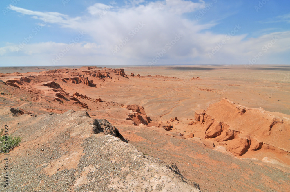 Fototapeta premium View on Bayanzag Flaming Cliffs on the Mongolian Gobi desert containing fossils of jurassic dinosaurs