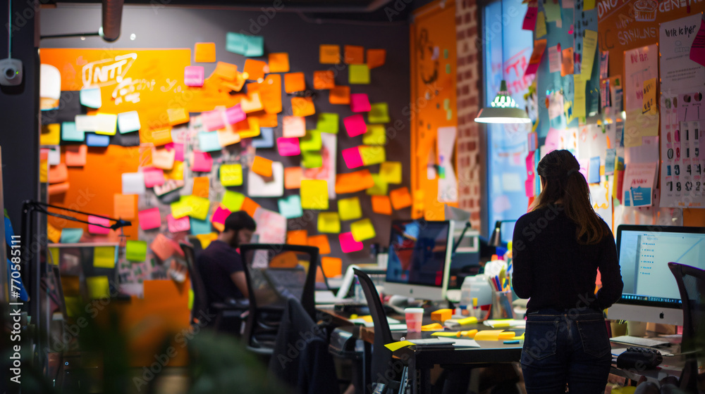 A creative brainstorming session in a vibrant startup environment with post-it notes and ideas everywhere.