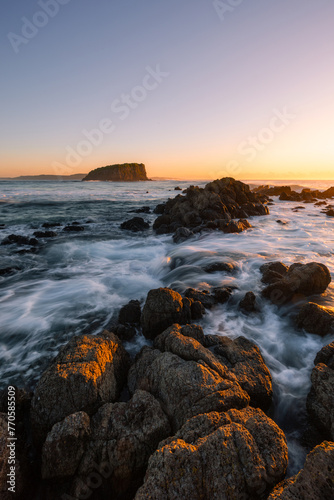 Beautiful sunrise view at rocky coastline of Minnamurra, Australia. photo