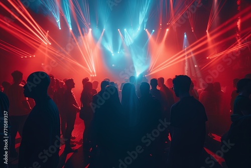 Crowd of attendees standing in front of a stage at a psychedelic rave in an underground venue. Generative AI