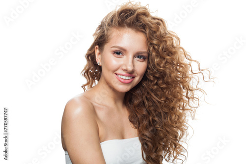 Isolated woman face. Young model with healthy skin, long hair and makeup on white background