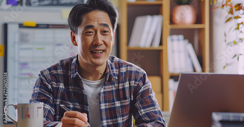 Asian teacher in his mid-30s teaching English online through video call on laptop, Generative AI photo