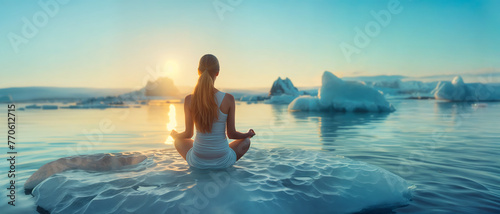 a woman meditates on an ice floe in the Arctic Ocean