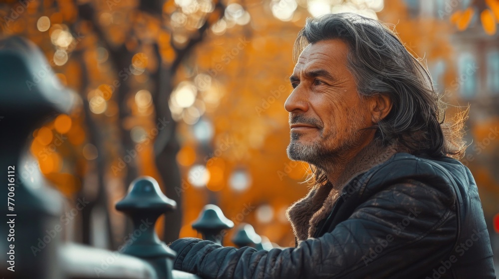 Smiling Senior Man Leaning On Wooden Fence On Walk Through Autumn Park Or Countryside Smiling Senior Man Leaning On Wooden Fence On Walk Through Autumn Park Or Countryside