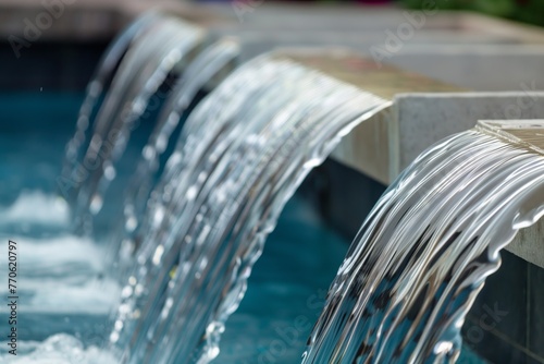 closeup of water spillway leading to pool gutter photo