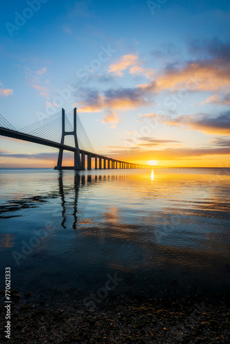 Vasco da Gama bridge over tagus river in Lisbon (Portugal), at sunrise