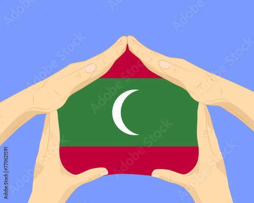 Hand home with Maldives flag, residential or investment idea, housing and home concept