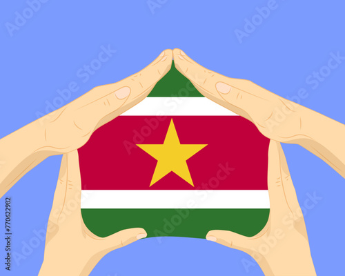 Hand home with Suriname flag, residential or investment idea, housing and home concept
