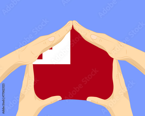 Hand home with Tonga flag, residential or investment idea, housing and home concept