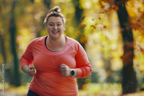 A overweight woman is running in a park with a smile on her face