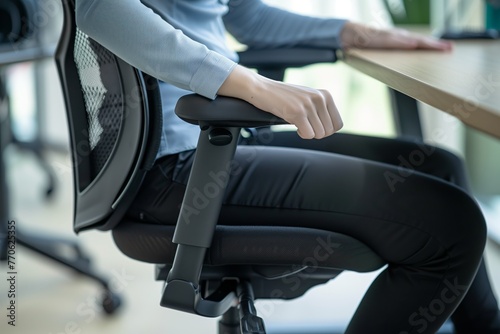 person testing ergonomic office chair comfort
