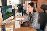 Graphic designer woman working in office