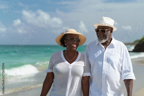 Elderly senior smiling active couple enjoying hiking and walking along the coastline near sea or ocean, showcasing an active retirement lifestyle filled with outdoor adventures and leisurely strolls. © Ilia