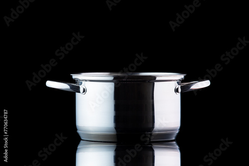 Stainless steel pan isolated on black. Cooking. kitchen utensils