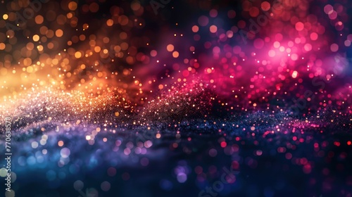 Colorful particle on a dark background © Attasit