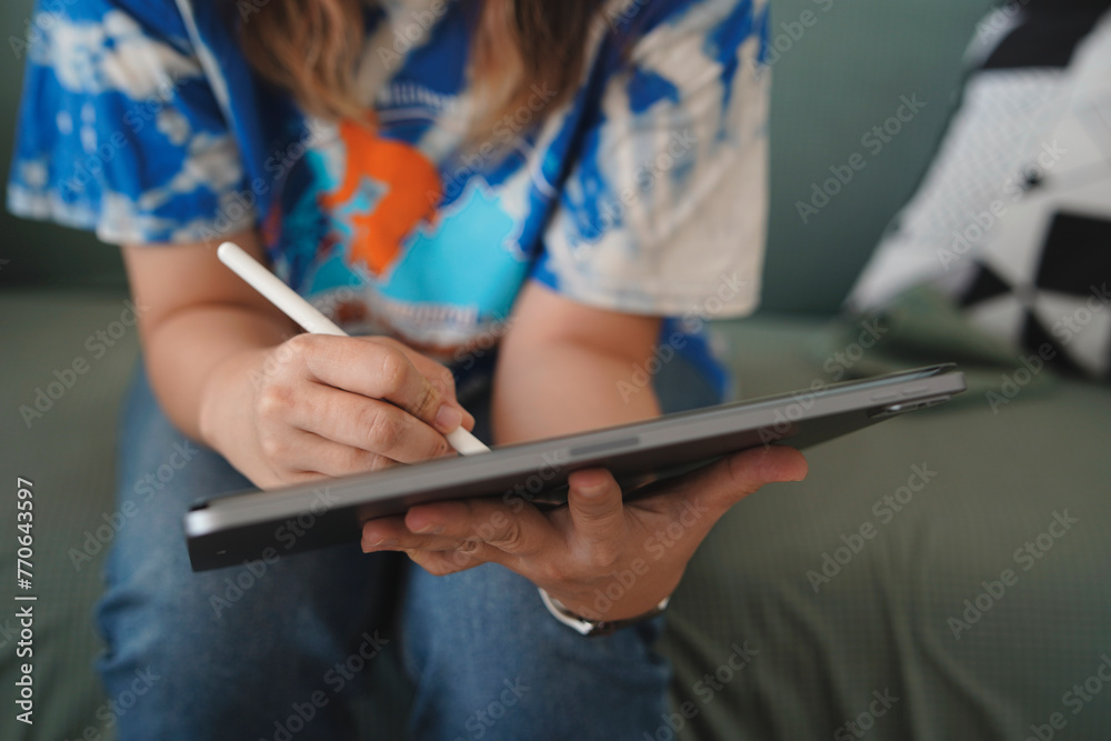 person writing in a notebook