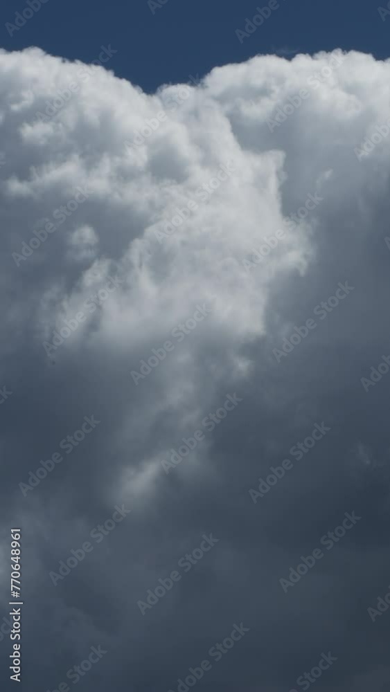 Clouds moving in blue sky. Time Lapse. 4K Vertical Clouds moving in blue sky. Time Lapse. 4K Vertical