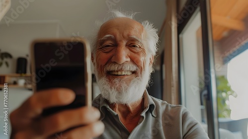 Cheerful Grandfather Sharing Stories During Video Call With Family Members