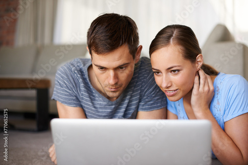 Couple, woman and man with laptop, search and relax with partner, girl and girlfriend on floor of home. Vacation, internet and female person browsing online for resort or hotel for date in holiday