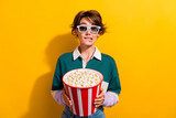 Photo of impressed scared lady dressed polo shirt vr eyewear eating pop corn watching film isolated yellow color background