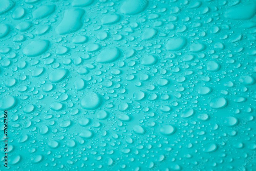Water Droplets On Blue Surface