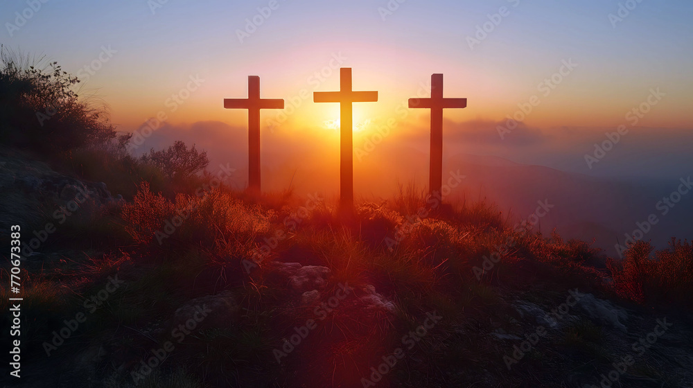 Three crosses on a hill at sunset and blue sky