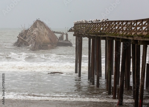 Coastal scene of Santa Cruz flooding in Jan 2023 showing the Cement Ship in Aptos, Capitola photo