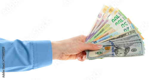 Female hand holding euro, dollars and British pounds currency isolated on white background