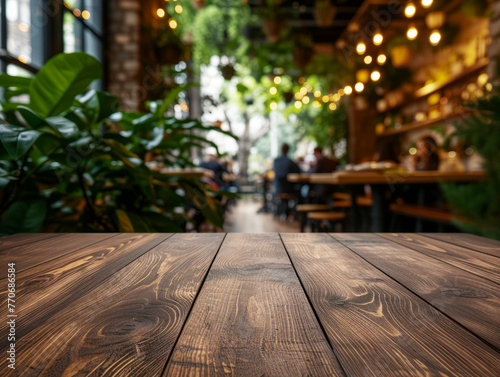 Empty wooden table with a blurred cafe background, warm tones, indoor dining concept, Generative AI. Generative AI