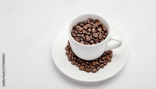 Coffee cup with roasted coffee beans on white background
