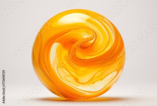 An orange ball of oil sits on a white background, its swirling vortexes reflecting youthful energy.