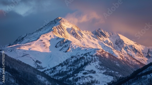 Awakening Wilderness: First Light Shining on Snow-Covered Mountains Amidst a Tranquil Forest