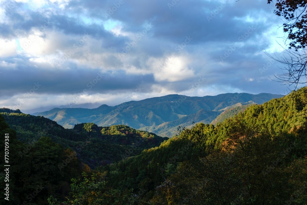 Idyllic landscape of a mountain range against the backdrop of the cloudy sky. Akagiyama, Japan