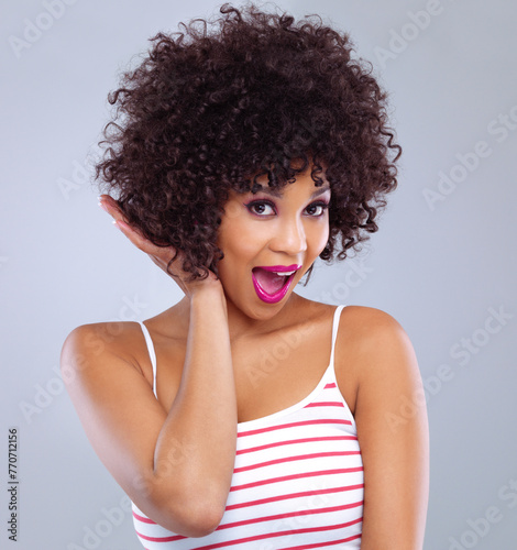Afro, portrait and smile for female person, haircare and cosmetics on studio background. Beauty salon, treatment and curly hairstyle for happy African woman model, cosmetology and natural aesthetic