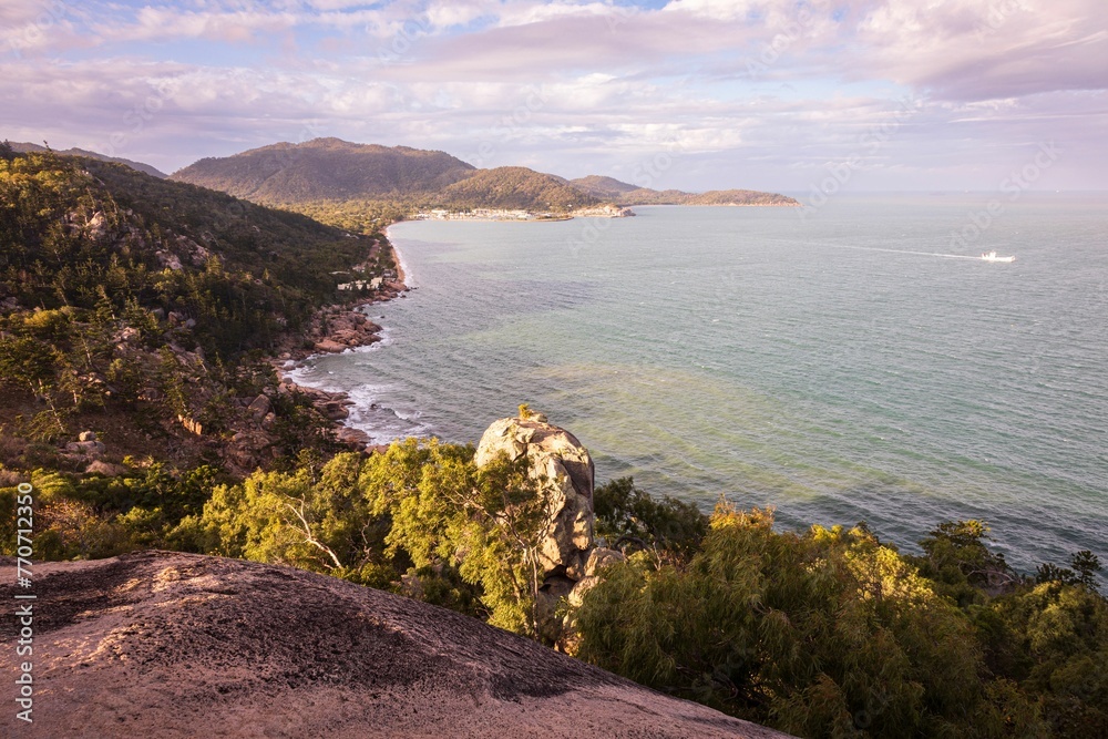 Aerial view of a beautiful sunset over Nelly Bay near Hawkings Point on Magnetic Island - obrazy, fototapety, plakaty 
