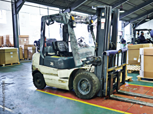 Logistics, forklift and shipping warehouse for distribution, supply chain and loading packages. Transport, cardboard box and industrial factory for inventory, stock and vehicle at freight company