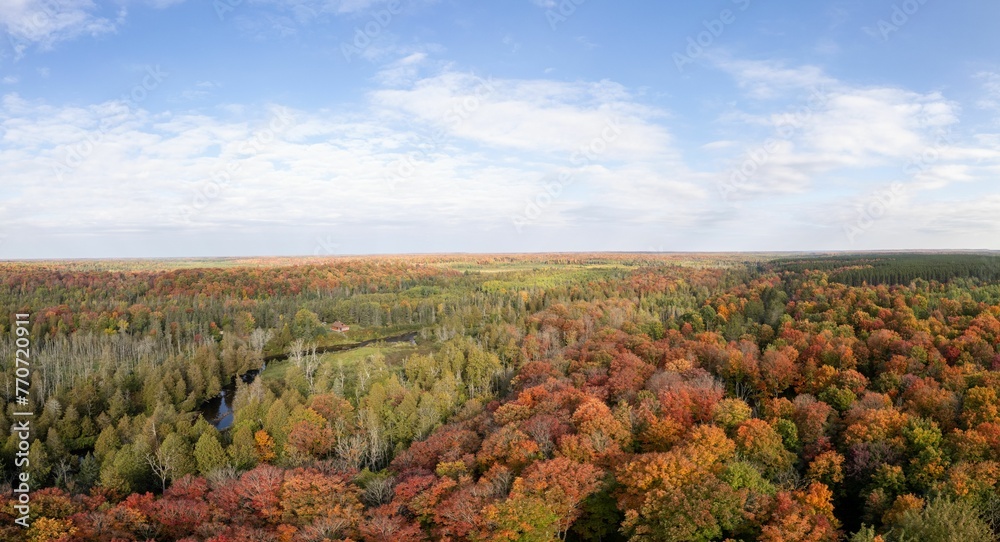 Aerial view of the fall forest in Michigan in the Porcupine Mountains