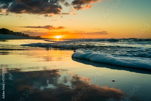 Beautiful seascape featuring a stunning sunset on the beach in Destin, Florida. photo