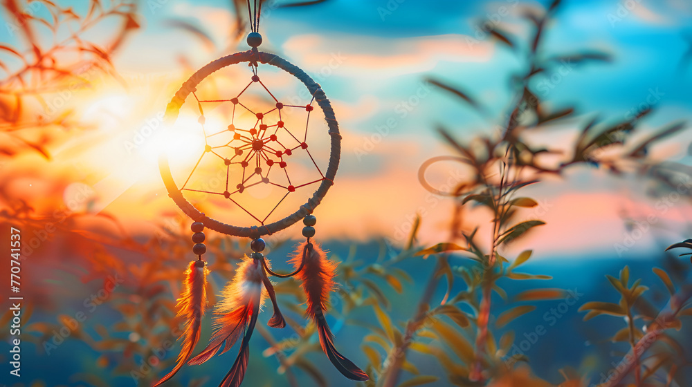 A dream catcher with feathers and a blue background, dreamcatcher hanging against a bright sky backdrop ,Beautiful dream catcher on blue background with lights
