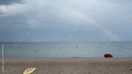 Strandlandschaft mit Regenbogen photo